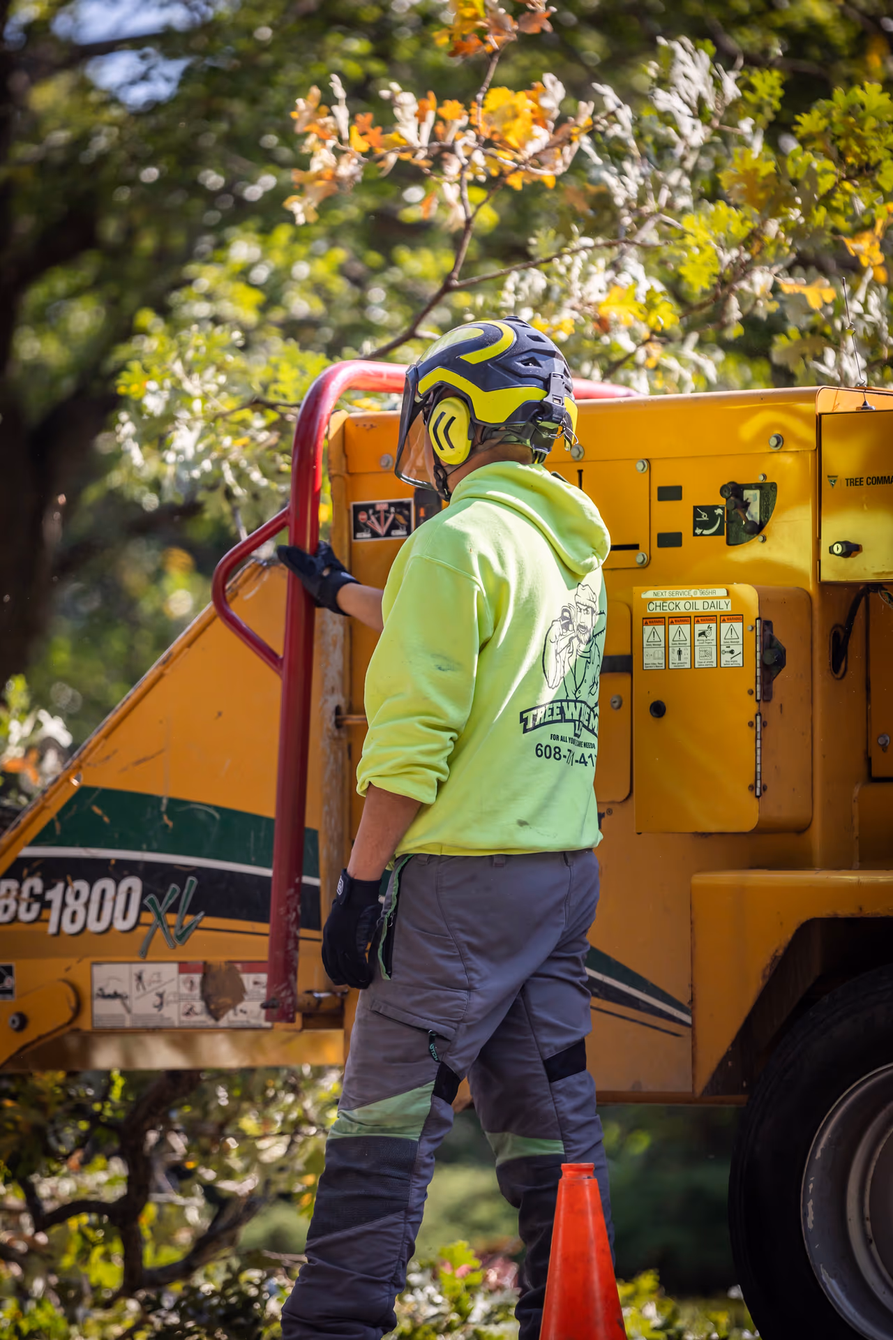 Feeding Brush Into the Chipper